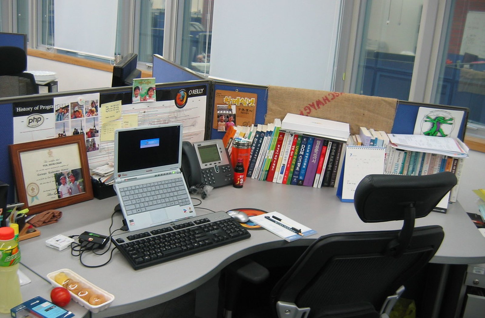 Real office desk workspace for discreet phone notification privacy